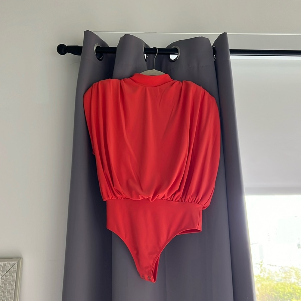 High neck, open back body suit